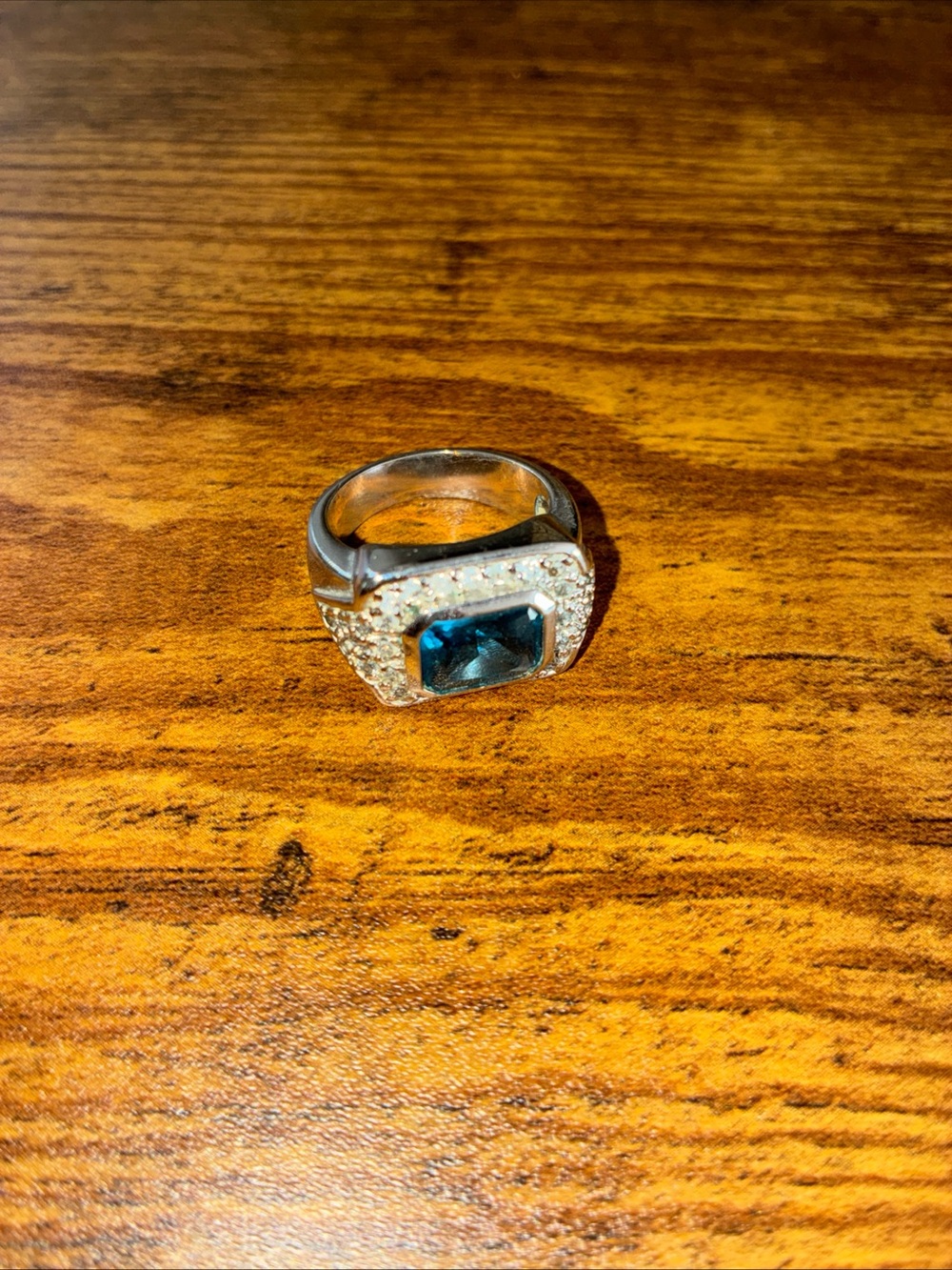 Silver Ring with Blue Center Gem and Pavé Accents